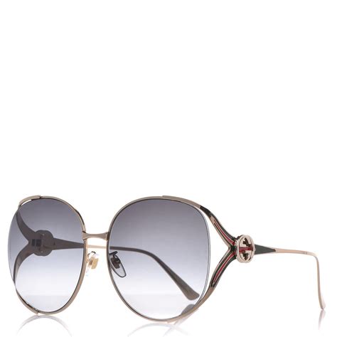 gucci round gold frame sunglasses.